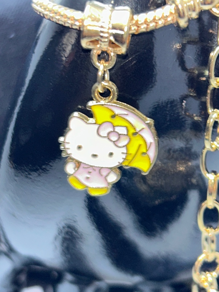Hello Kitty Gold Charm Bracelet With Yellow And Pink Enamel Charms 15$